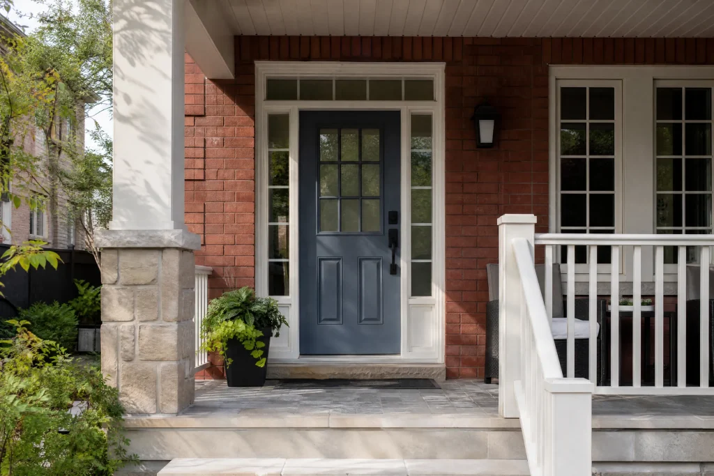 Townhouse front door freshly painted slate blue